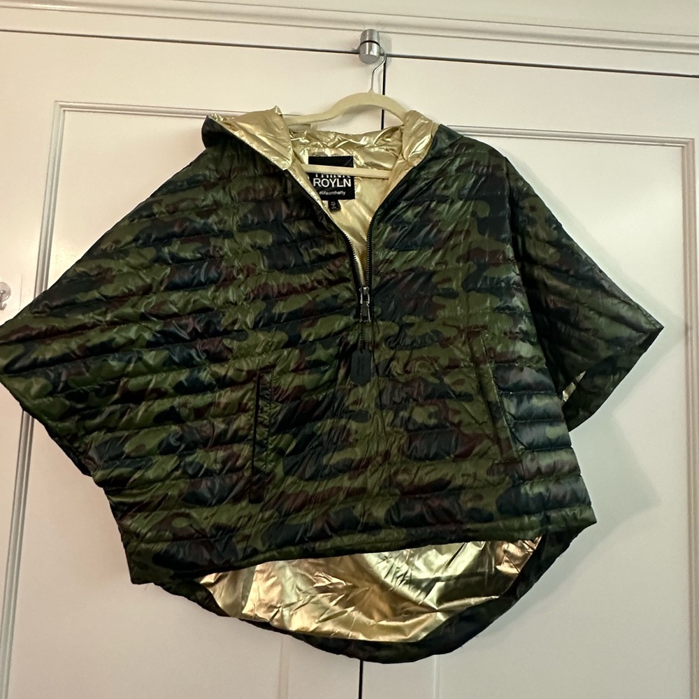 Camouflage puffer poncho style fall jacket. In great condition.